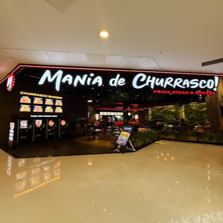 Logo da loja mania de churrasco
